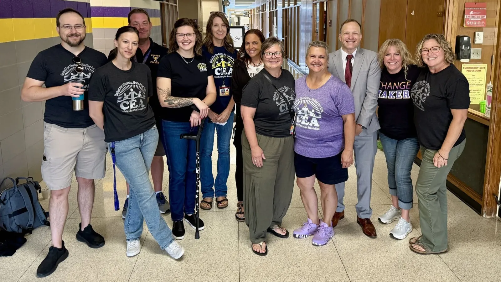 Group picture of union leaders in hallway
