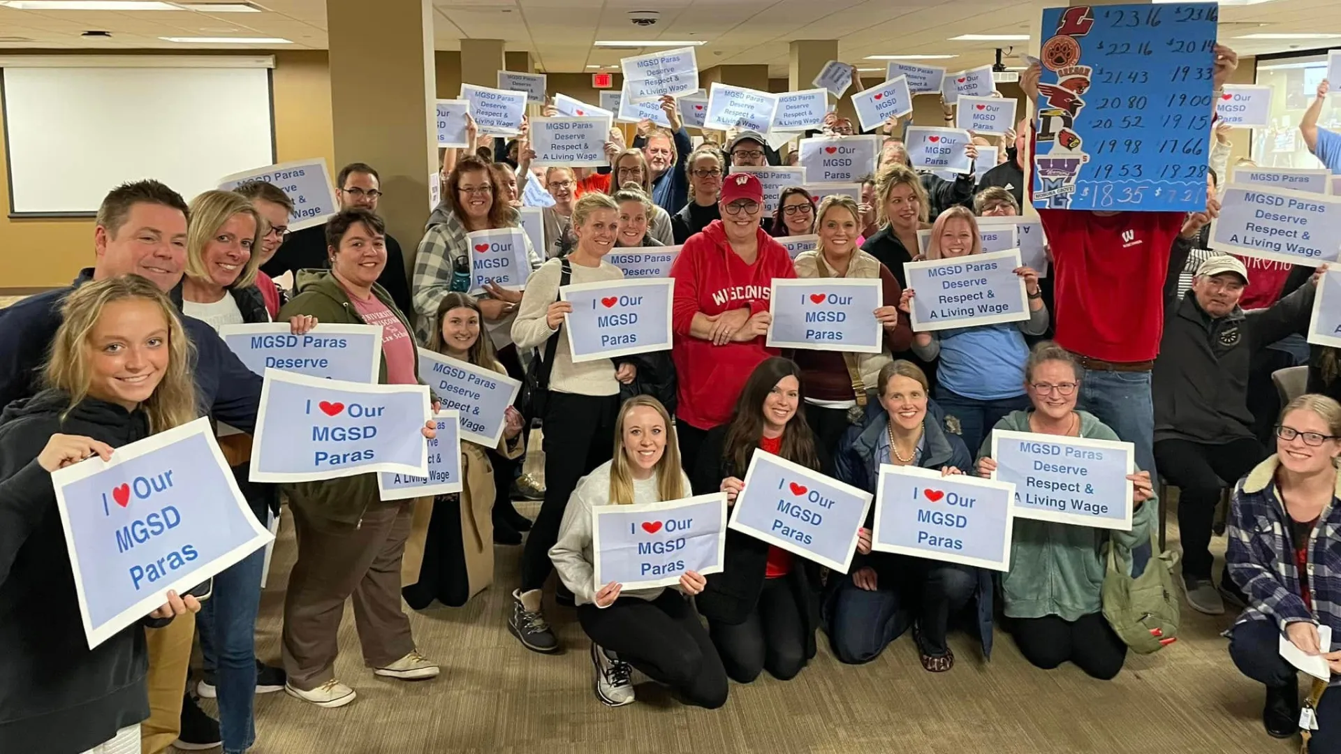 Monona Grove Education Association paraprofessionals members celebrating their victory for better and fairer wages