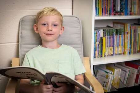 seated student reading