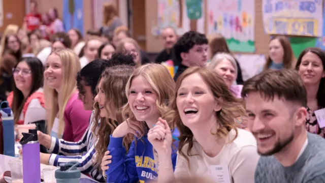 Aspiring Educators members in a group laughing